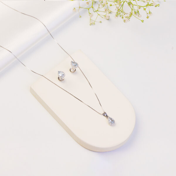 92.5 Silver Teardrop Pendant set with matching earrings surrounded by zircon stones